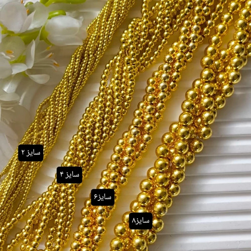 سنگ حدید طلایی براق سایز 4 (فروش محصول بصورت یک ریسه میباشد)