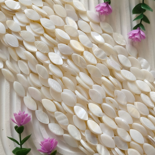 سنگ صدف طرح بیضی (فروش بصورت ریسه ای شامل 22 مهره)